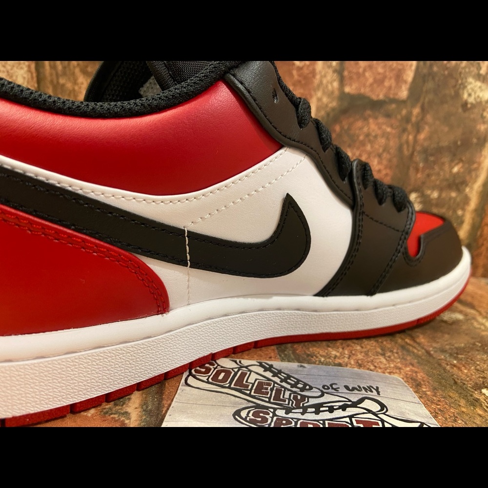 NEW Nike Air Jordan 1 Retro Low Bred Toe Red Black White Banned Chicago Mens GS - Picture 11 of 11